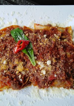 Una foto de Ravioles caseros en salsa a la bolognesa👍🇵🇪