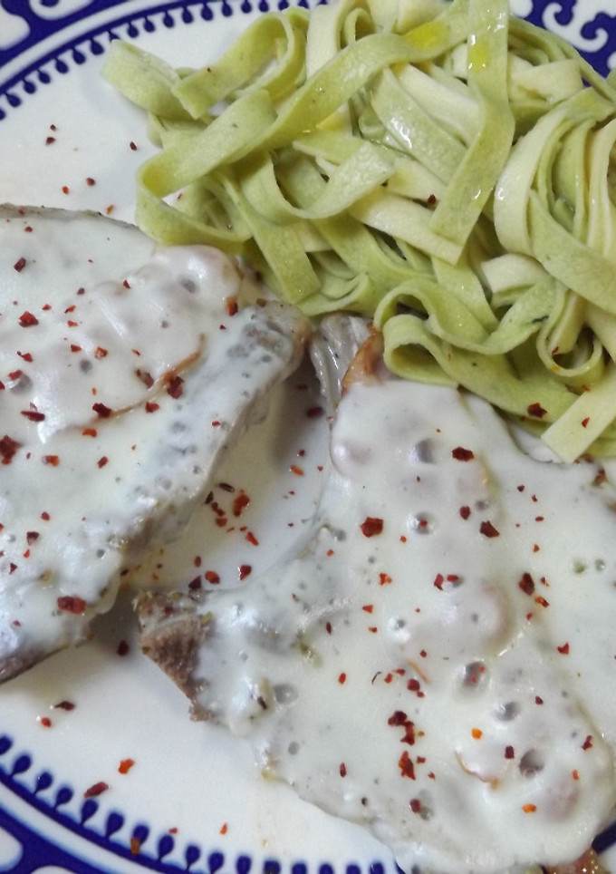 Una foto de Chuletas con bacon y mozzarella
