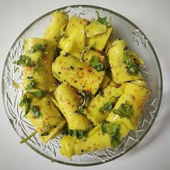 A picture of Cheese Stuffed Khandvi.