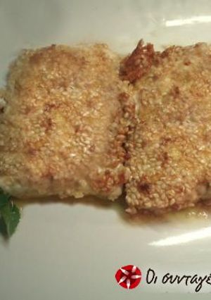 A picture of Feta Saganaki with Sesame Crust.