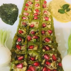 A picture of Moong Dal Net Chilla with Coconut Stuffing.