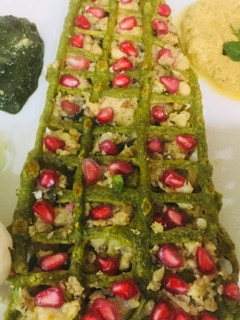 A picture of Moong Dal Net Chilla with Coconut Stuffing.