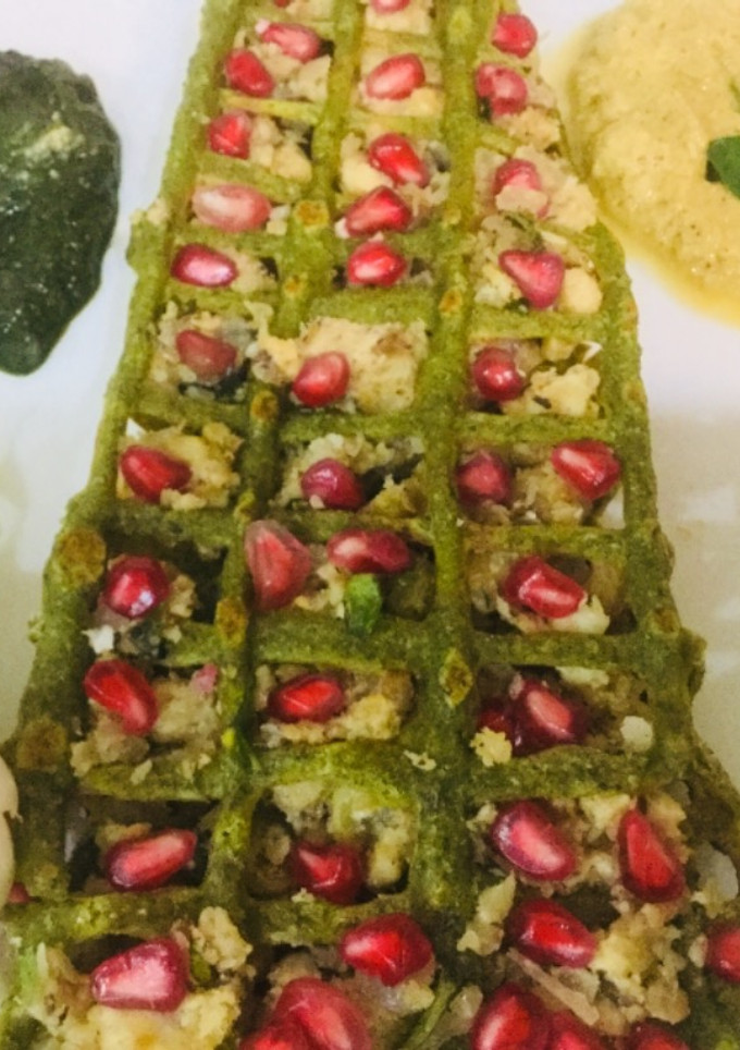 A picture of Moong Dal Net Chilla with Coconut Stuffing.