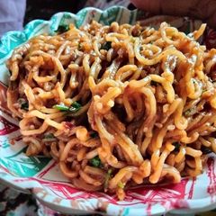 A picture of Korean style spicy Maggi.
