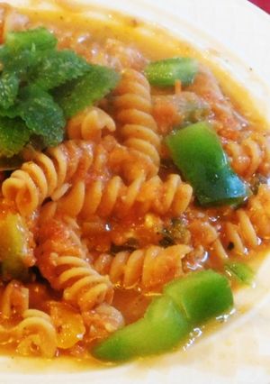 A picture of Pasta sizzler sizzling with hot chilli powder, veggies, cheese.