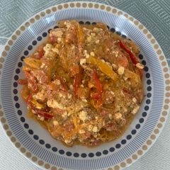 A picture of Rosted bell peppers tomatoes and cottage cheese.