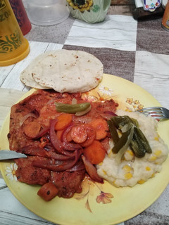 Una foto de O internacional 👨🏻🍳 milanesa de puerco