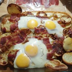 A picture of Broken eggs with Jamon (Serrano Ham).