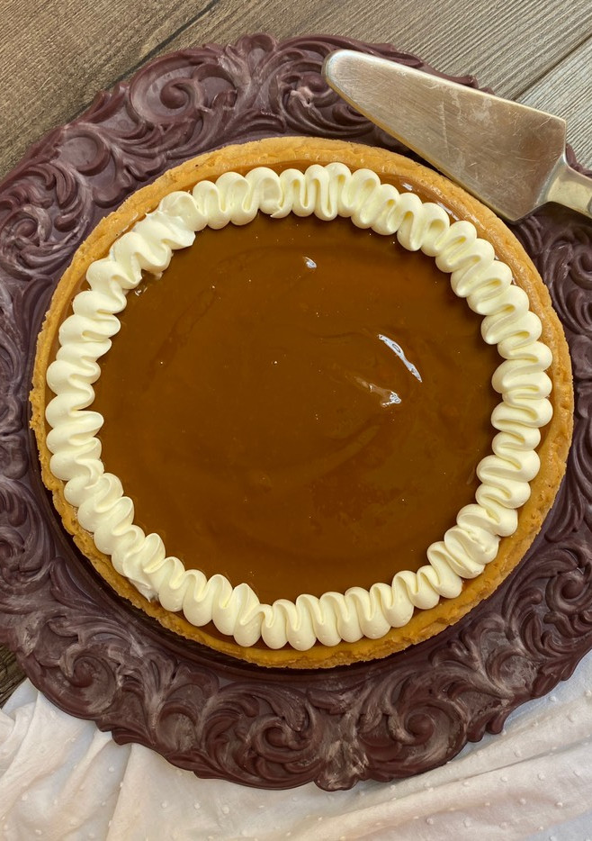 Una foto de Cheesecake de dulce de leche
