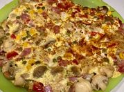 Una foto de tortilla de setas con jamón