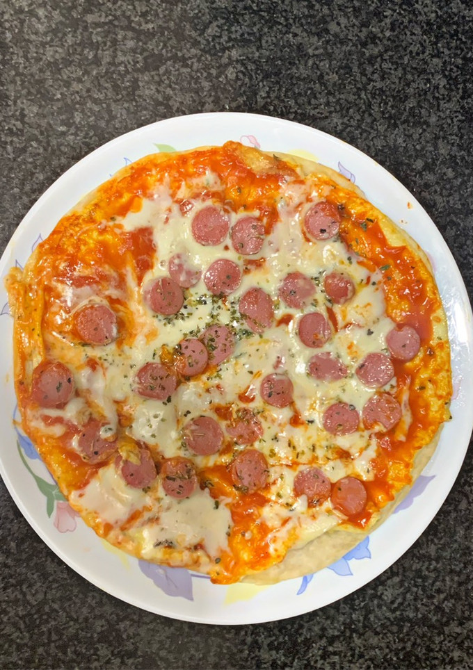 Una foto de Pizza a la sartén