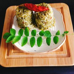 A picture of Andhra Gongura Pachadi with Steamed Rice.