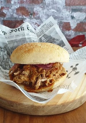 A picture of Pulled Pork in a Slow Cooker.