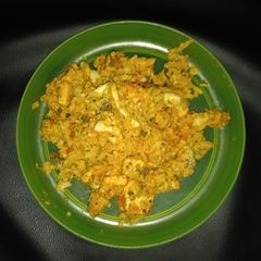 A picture of Cauliflower rice with smoked tofu in vegan sweet-mustard and ajvar sauce.
