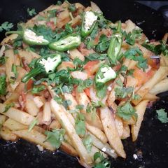 A picture of Tawa fries aloo bujhia.