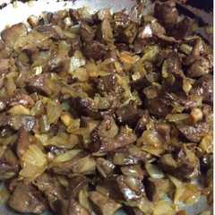 Una foto de Asadurilla de cordero lechal encebollada