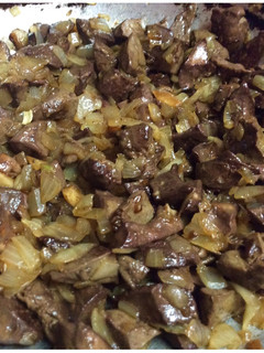 Una foto de Asadurilla de cordero lechal encebollada