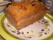 Una foto de pan de navidad de naranja