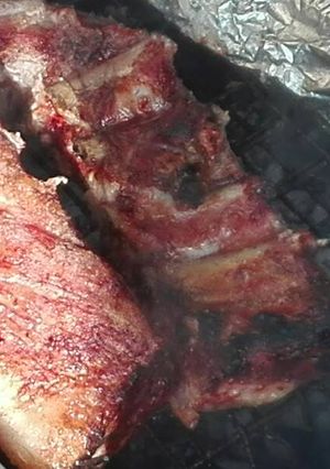 Una foto de Asadito de cerdo y vaca