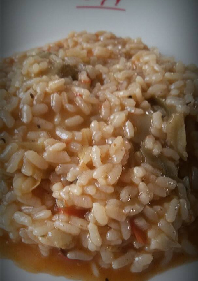 Una foto de Arroz meloso de alcachofa y tomate de ramallet