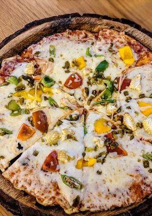 A picture of Pesto Pepper Pizza (Jain).