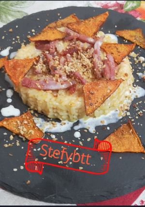 A picture of Pumpkin Risotto with Hazelnuts and Taleggio Fondue.
