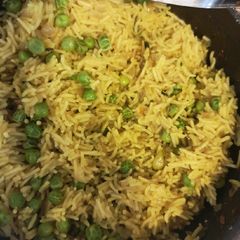 A picture of Flavoured Rice with Peas.