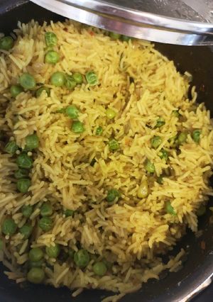A picture of Flavoured Rice with Peas.
