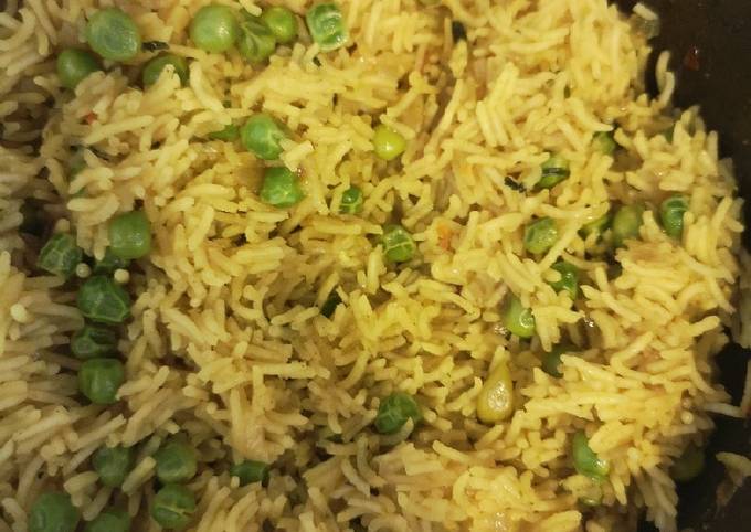 Flavoured Rice with Peas Recipe by Anne - Cookpad