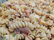 A picture of penne pasta salad