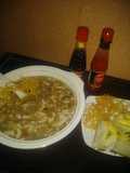 Chicken manchow soup with scallion garlic bread
