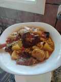Albondigas con sepia,patatas y alcachofas