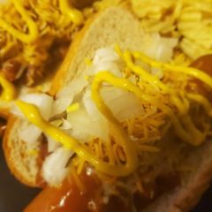 A picture of Ultimate chili cheese dog.