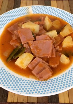 Una foto de Mortadela con papas y poblano
