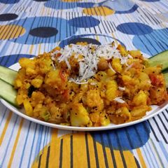 A picture of Potato and coconut dry masala.