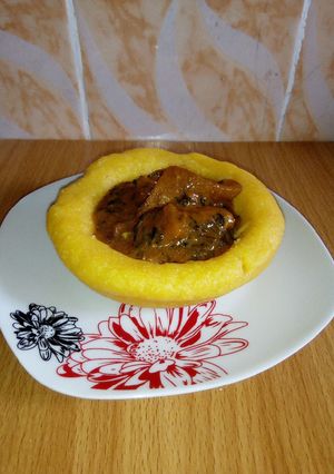 A picture of Eba and Ogbonor soup.
