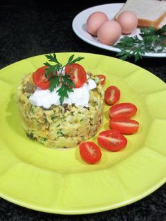 Una foto de Revuelto de huevos con pan Bimbo y queso Philadelphia