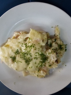Una foto de Papas fileteadas en olla 🍽🍷