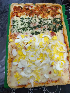 Una foto de Pizza casera con harina leudante