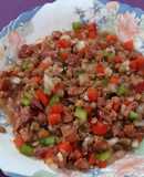 Ensalada templada de lentejas con chorizo y jamón, aliñadas a nuestro estilo