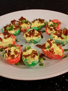 A picture of Bacon and Jalapeno Deviled Eggs colored for Christmas.