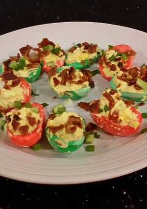 A picture of Bacon and Jalapeno Deviled Eggs colored for Christmas.