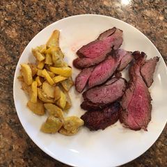 A picture of Grilled Butterflied Leg Of Lamb.