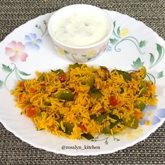A picture of Capsicum Tomato Rice.