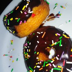 A picture of Chocolate donuts.