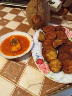 صورة لوصفة باذنجان مرمل مع صوص الطماطم