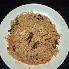 A picture of Noodles with kilishi chunks.