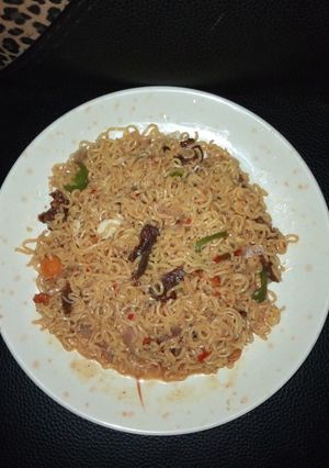 A picture of Noodles with kilishi chunks.