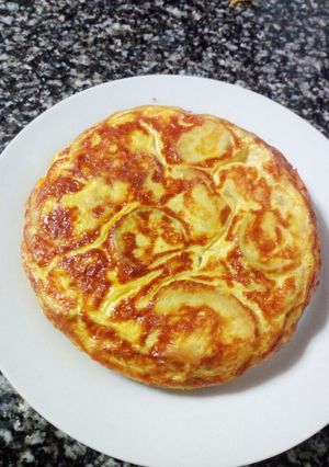 Una foto de Tortilla de patata y calabacín