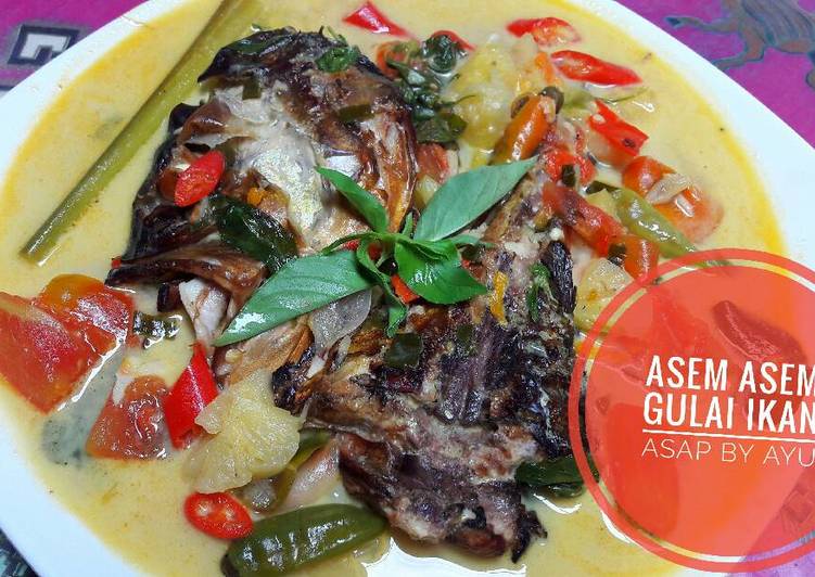 Proses meracik Asem Asem Gulai Ikan Asap Pedass yang Lezat